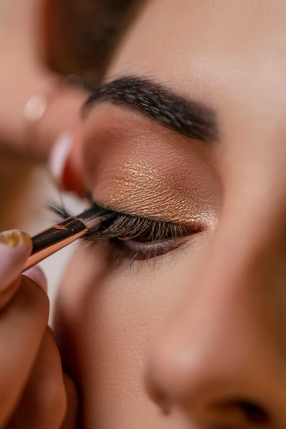 Close-up eye makeup application